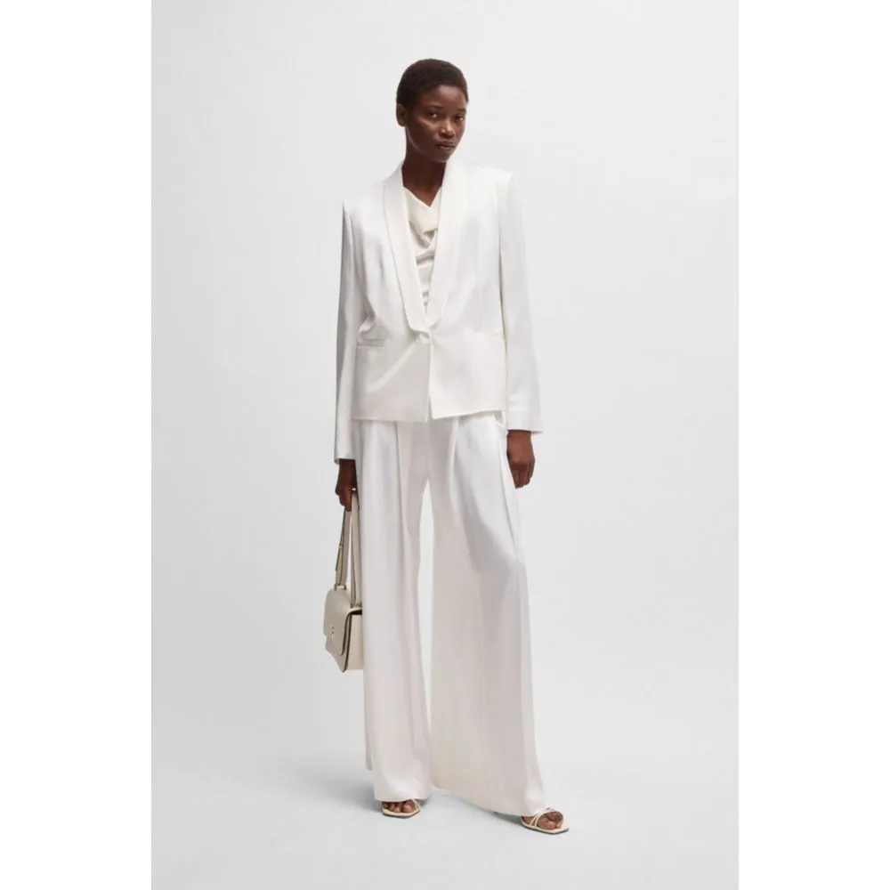 Relaxed-fit trousers with front pleats